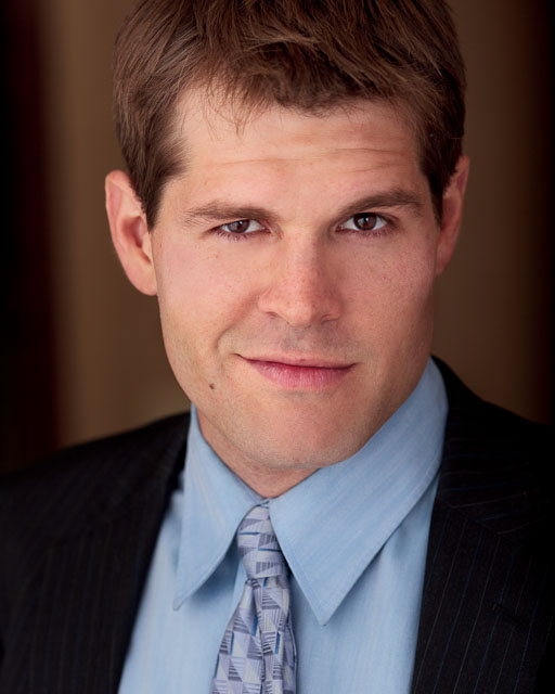 Professional headshot of an man in business attire by Austin Portrait Photographer