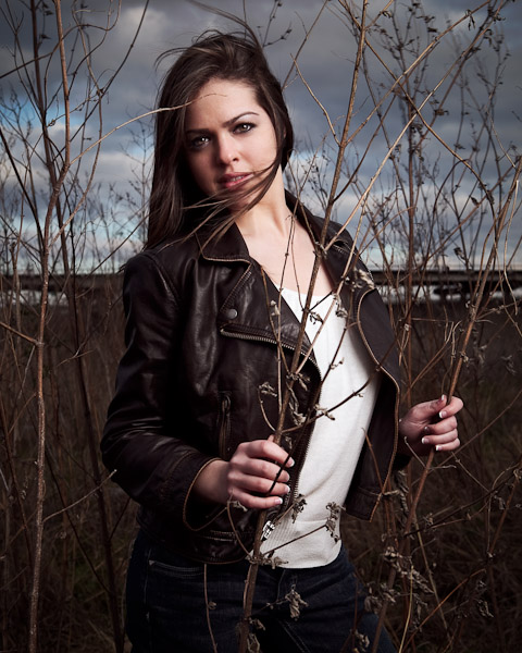 Portrait fashion photo of a girl in the brush